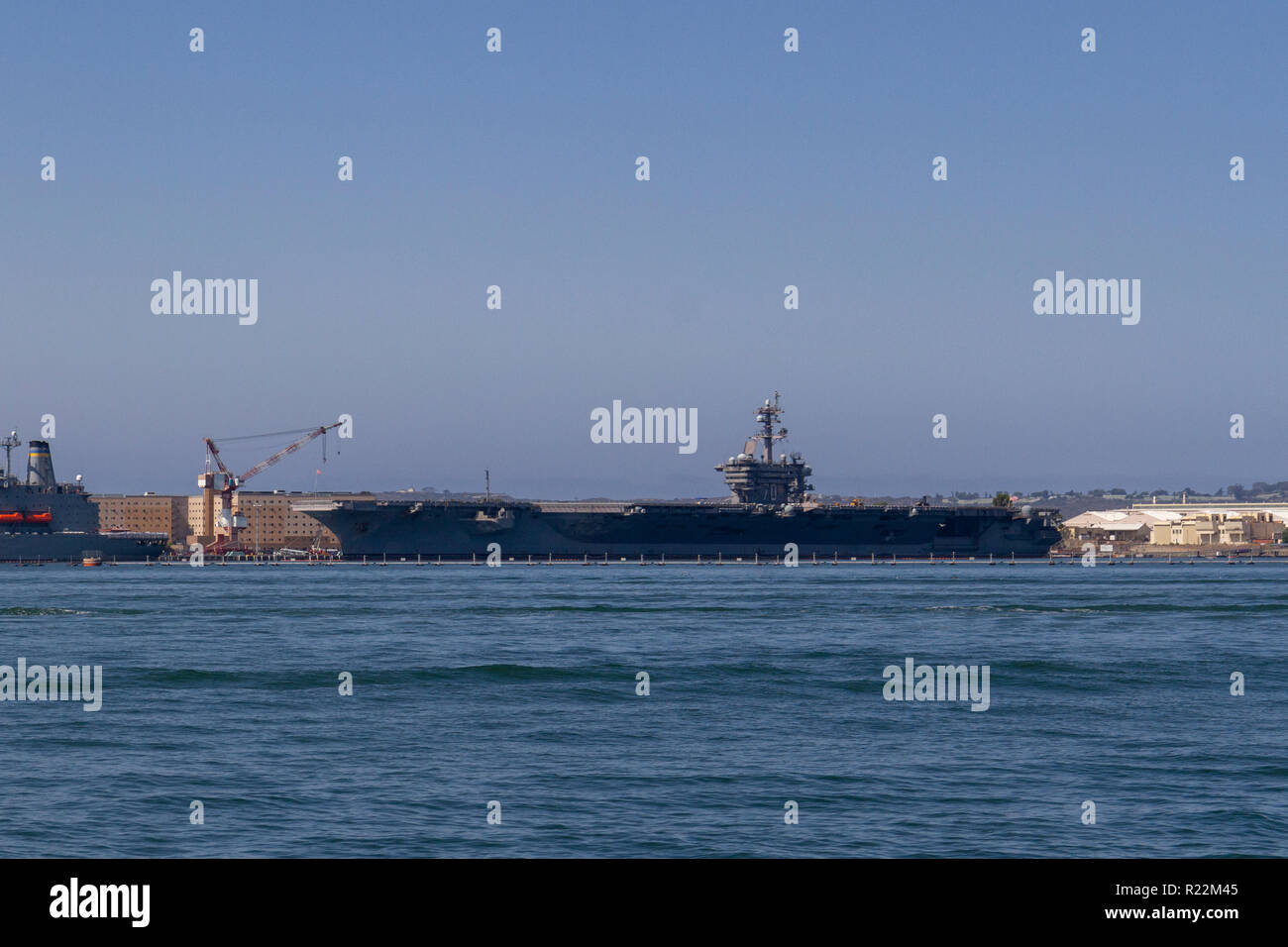 The USS Carl Vinson (CVN-70), a  Nimitz-class supercarrier, moored in  Naval Base Kitsap, San DIego, United States (for maintenance). Stock Photo