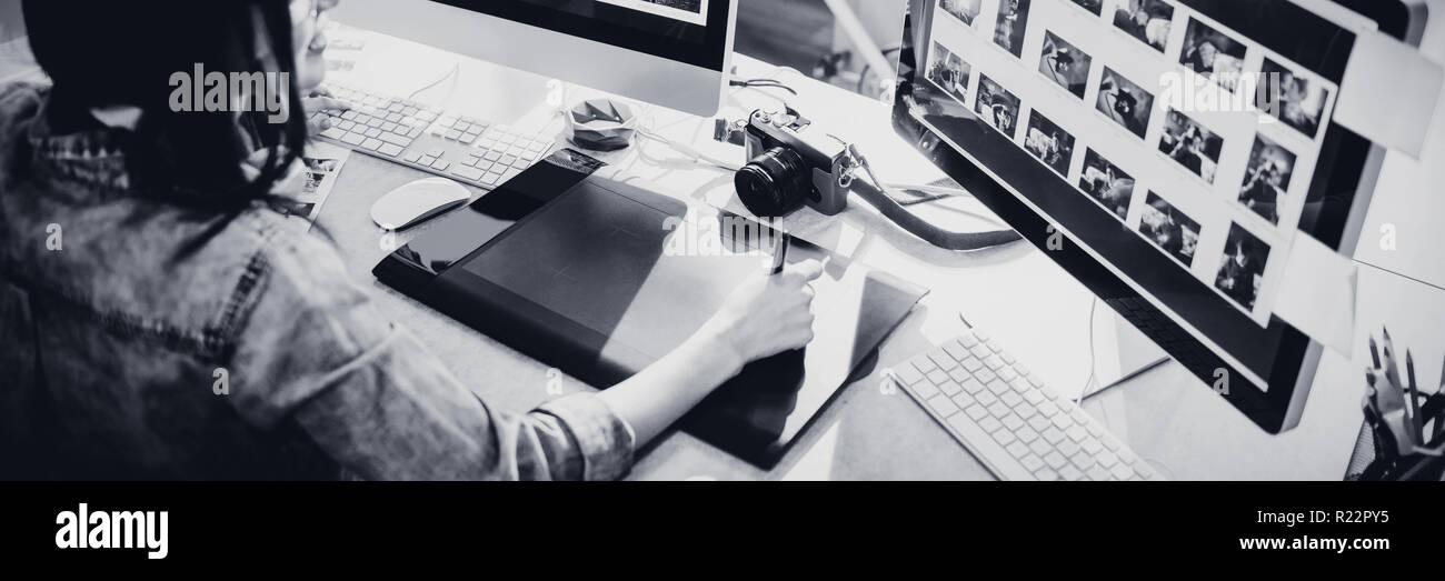 High angle view of graphic designer using graphics tablet Stock Photo