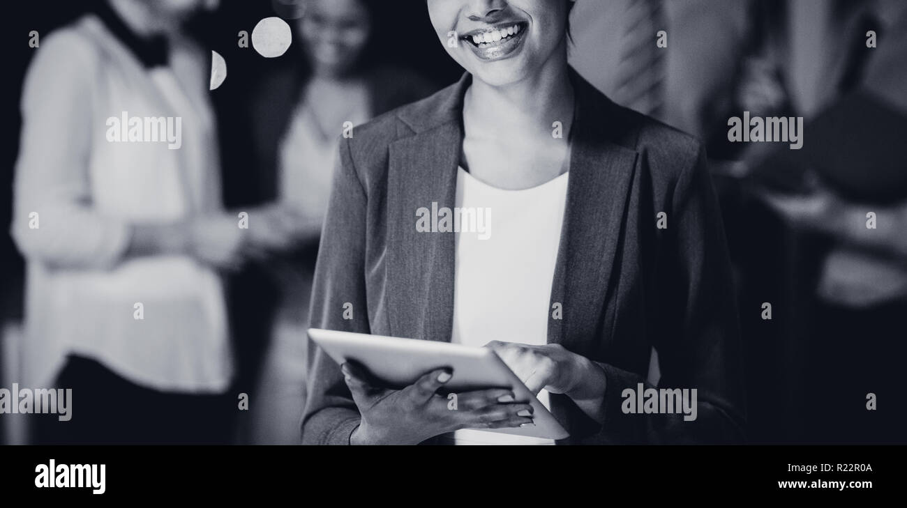 Businesswoman using digital tablet Stock Photo