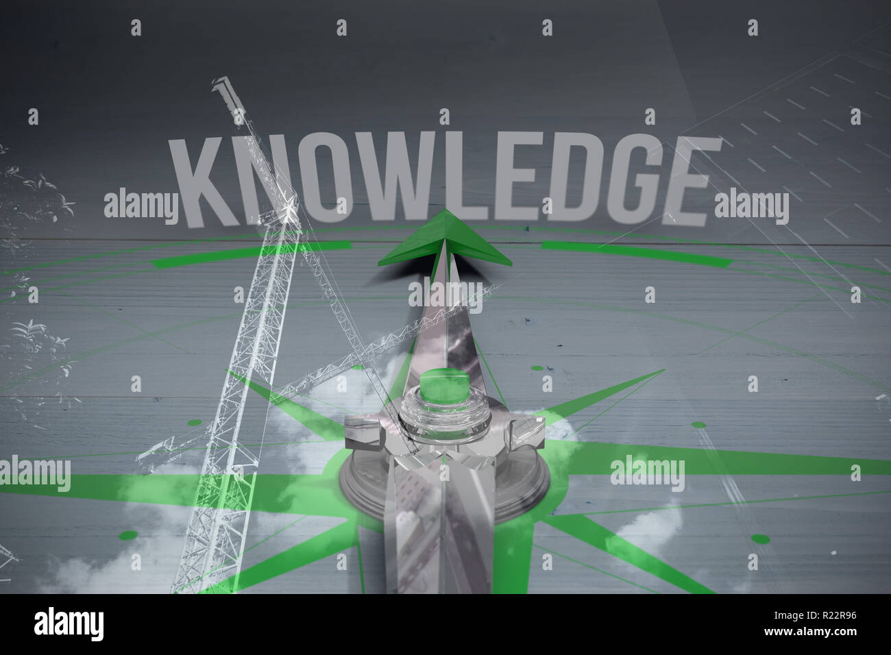 Composite image of compass with knowledge text Stock Photo - Alamy