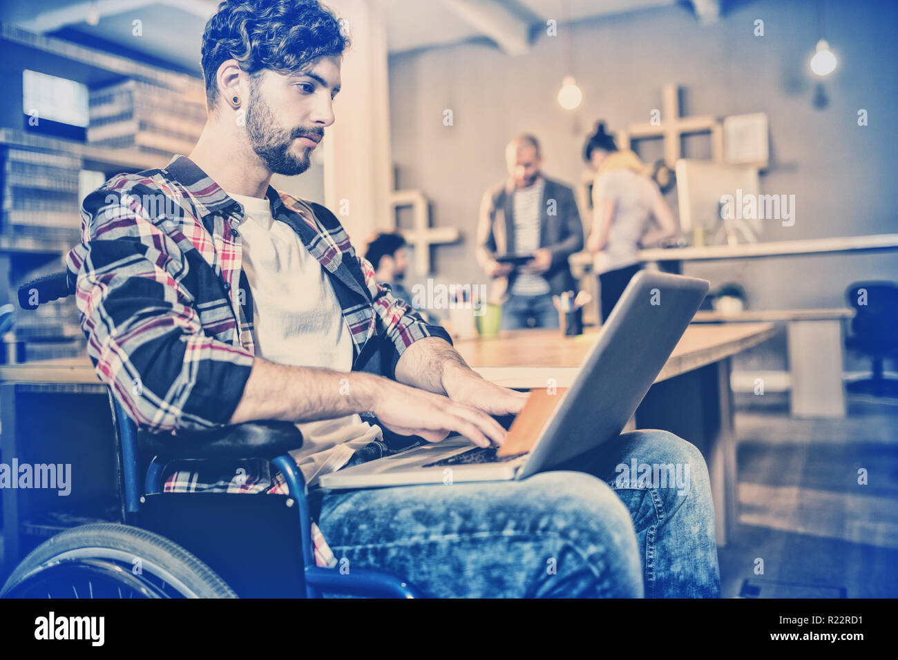 Graphic designer using laptop Stock Photo