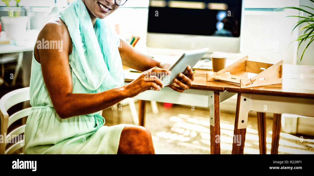 Business executive using digital tablet Stock Photo