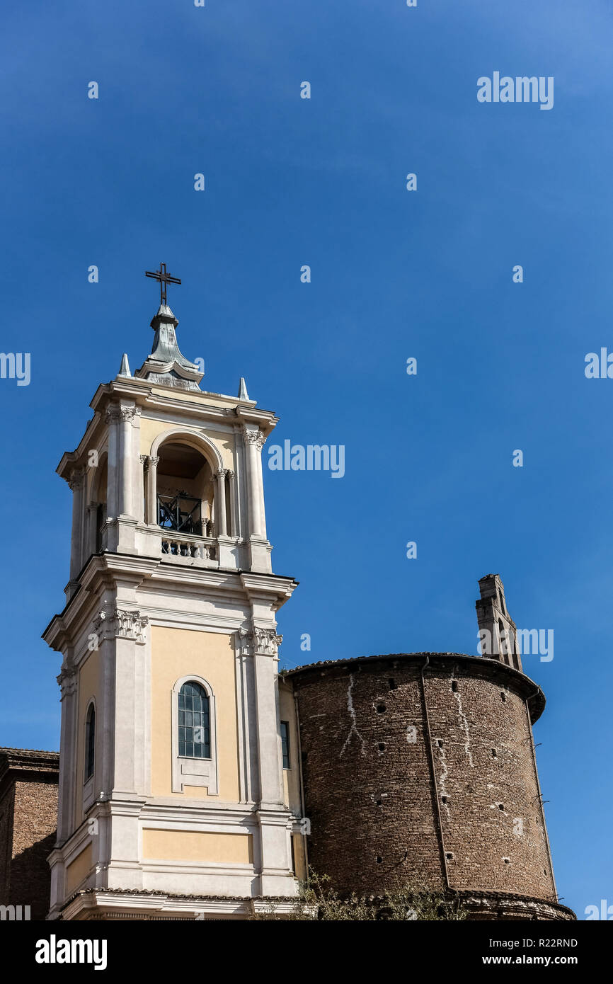Santa Maria Delle Grazie Alle Fornaci, Italy. Bell tower. Sait Mary of Graces Church. Rome, Italy, Europe, EU. Blue sky, low angle view, pov. Stock Photo