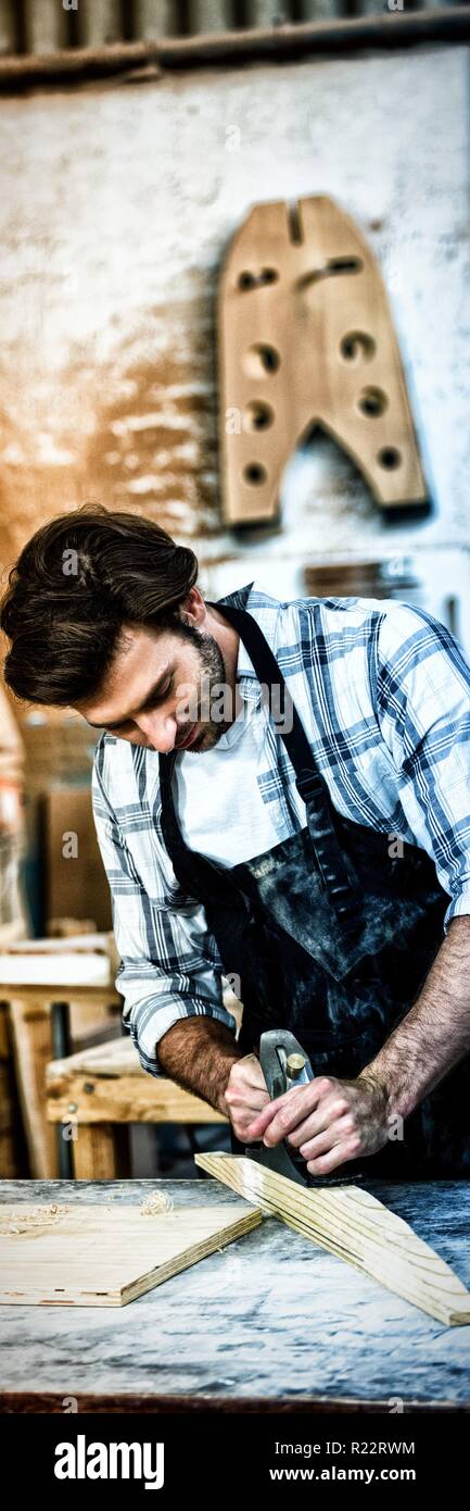 Carpenter working on his craft Stock Photo