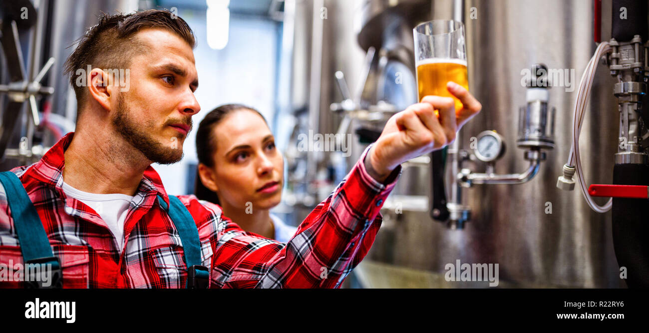Brewers testing beer Stock Photo