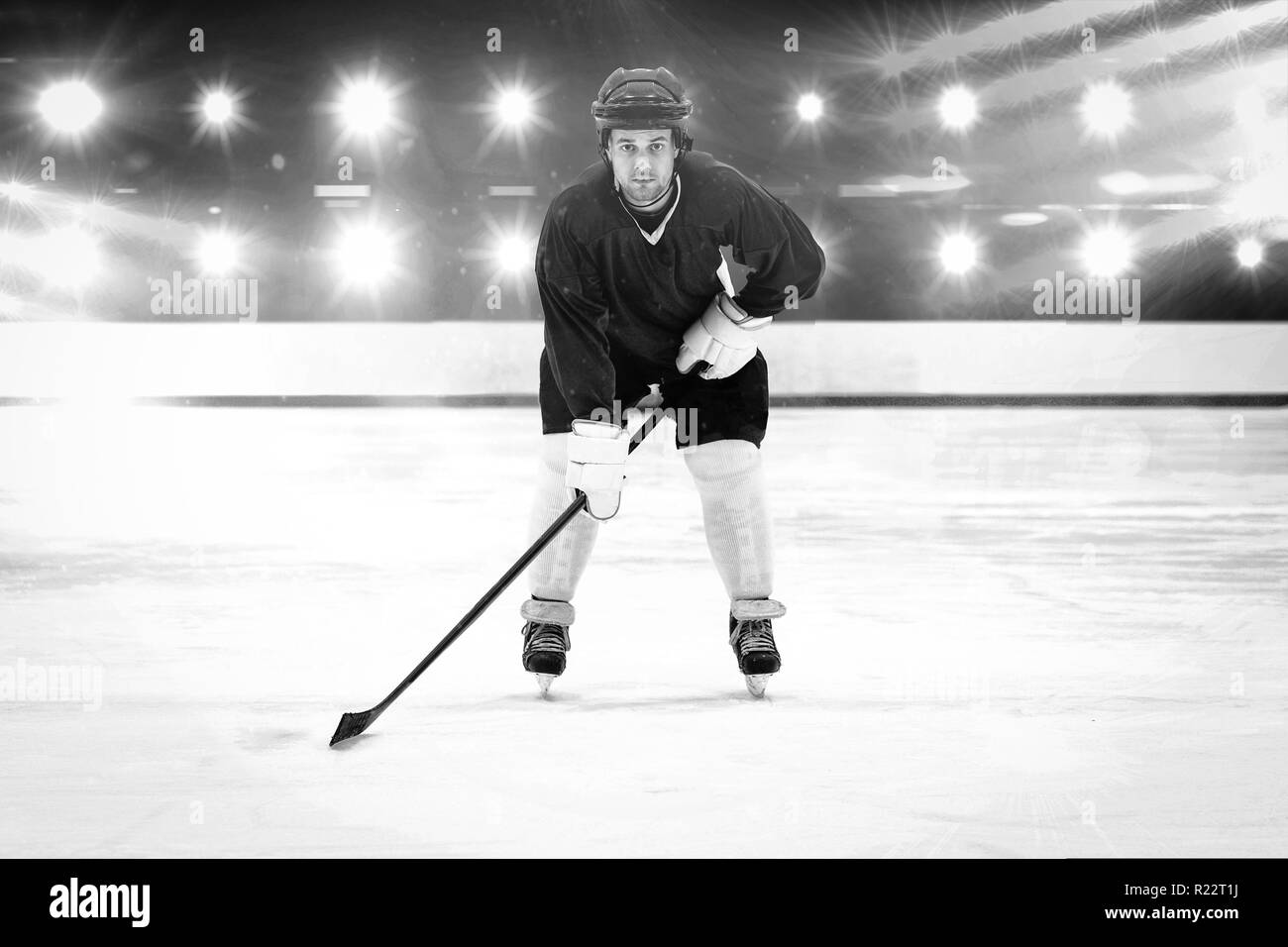 Composite image of player playing ice hockey Stock Photo