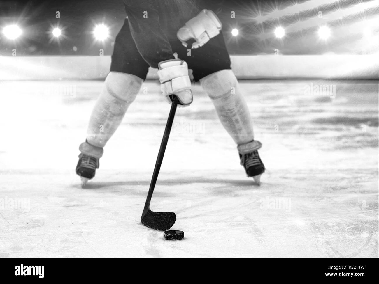 Composite image of player playing ice hockey Stock Photo