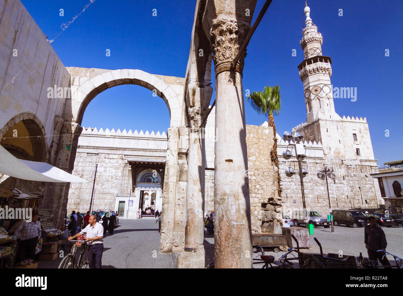 Damascus, Syria People walk under the ruins of the Roman Jupiter
