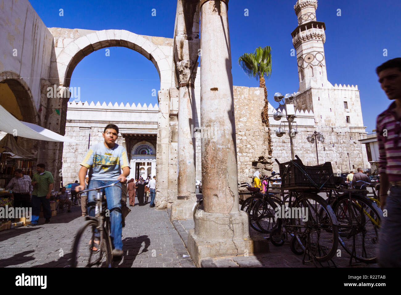 Damascus, Syria People walk under the ruins of the Roman Jupiter