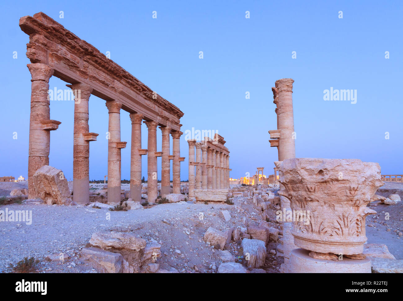 Palmyra, Homs Governorate, Syria - May 26th, 2009 :  Great Colonnade of Palmyra at dusk. Built  during the second and third century CE, it stretched f Stock Photo