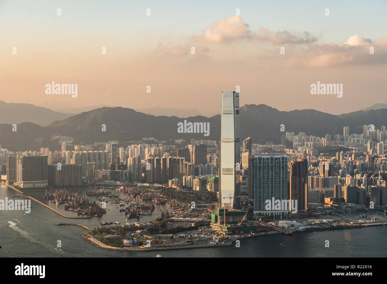 Sunset over Kowloon skyline from the Victoria peak in Hong Kong SAR, China Stock Photo
