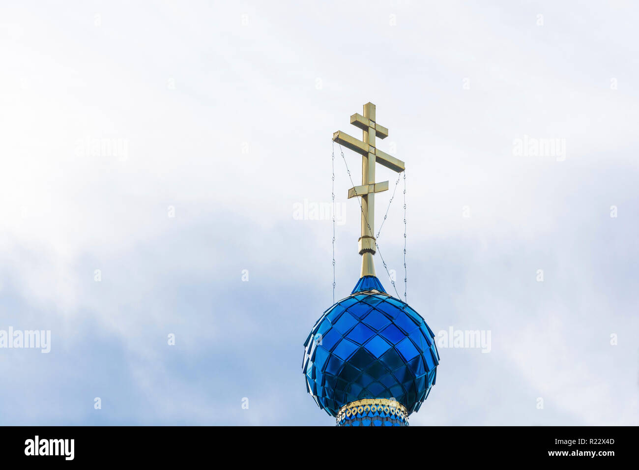 Beautiful Orthodox church dome with a cross on a background of the ...