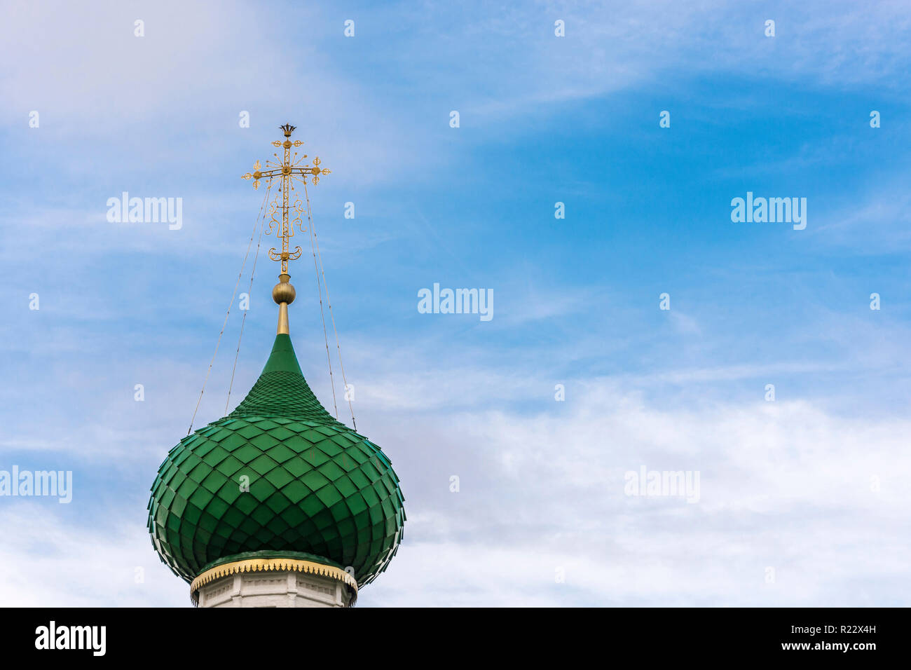 Beautiful Orthodox church dome with a cross on a background of the ...