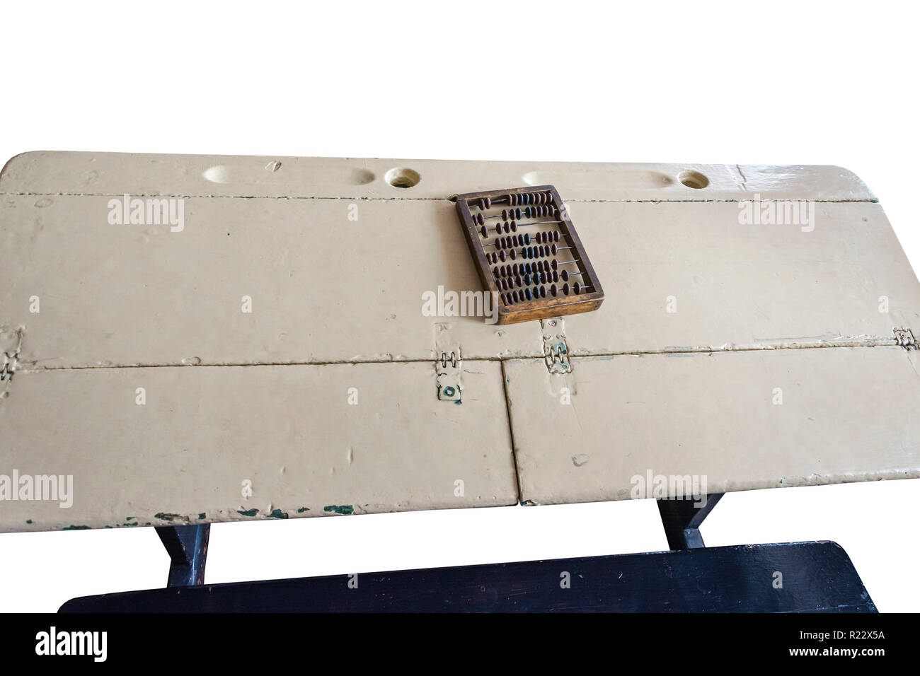 Old school desk 60-70-ies of the 20th century with wooden bills in the USSR on a white background. Stock Photo