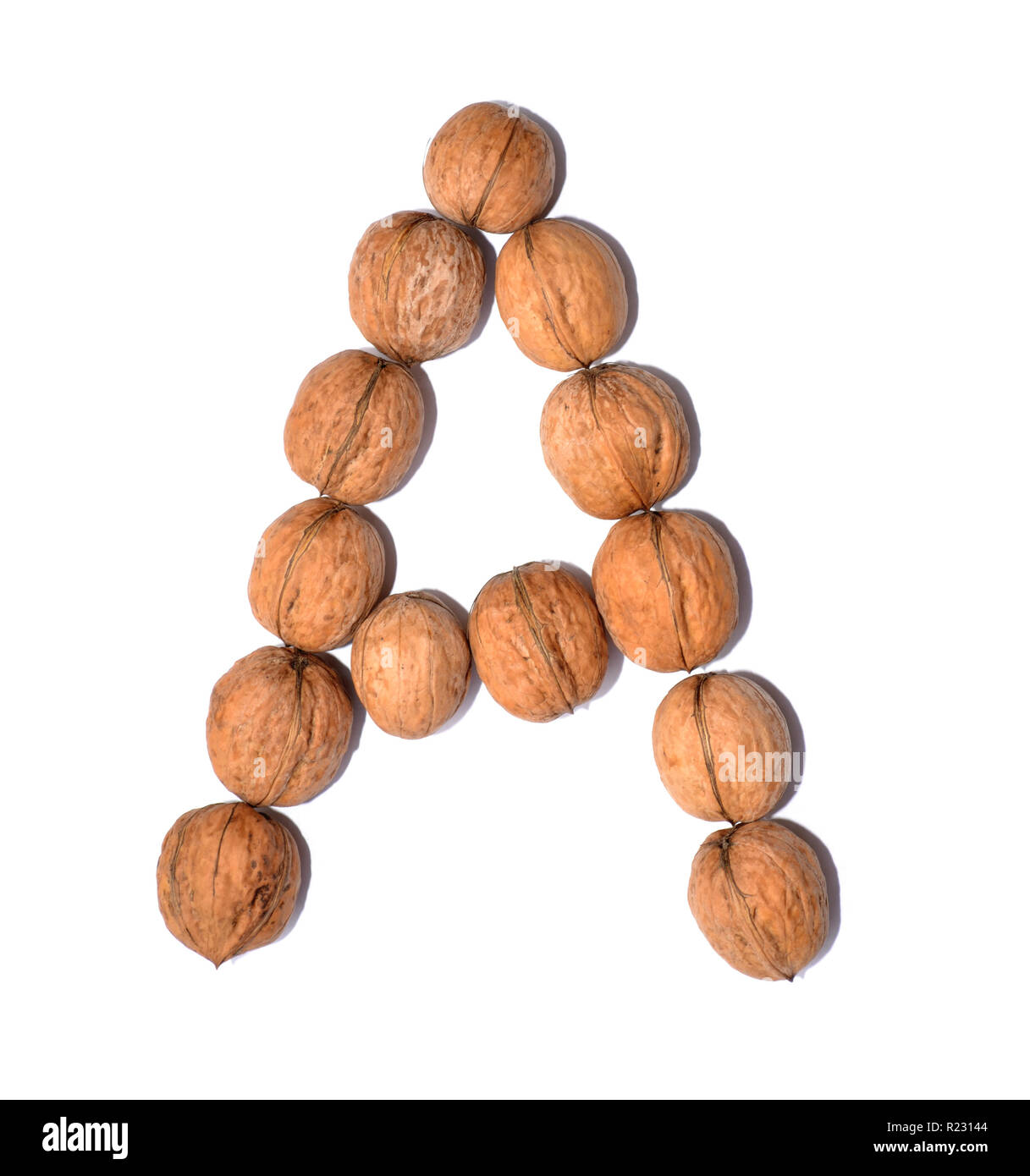 Letter A made with nuts to form a letter of the alphabet. Fruit letters on a white background. Stock Photo
