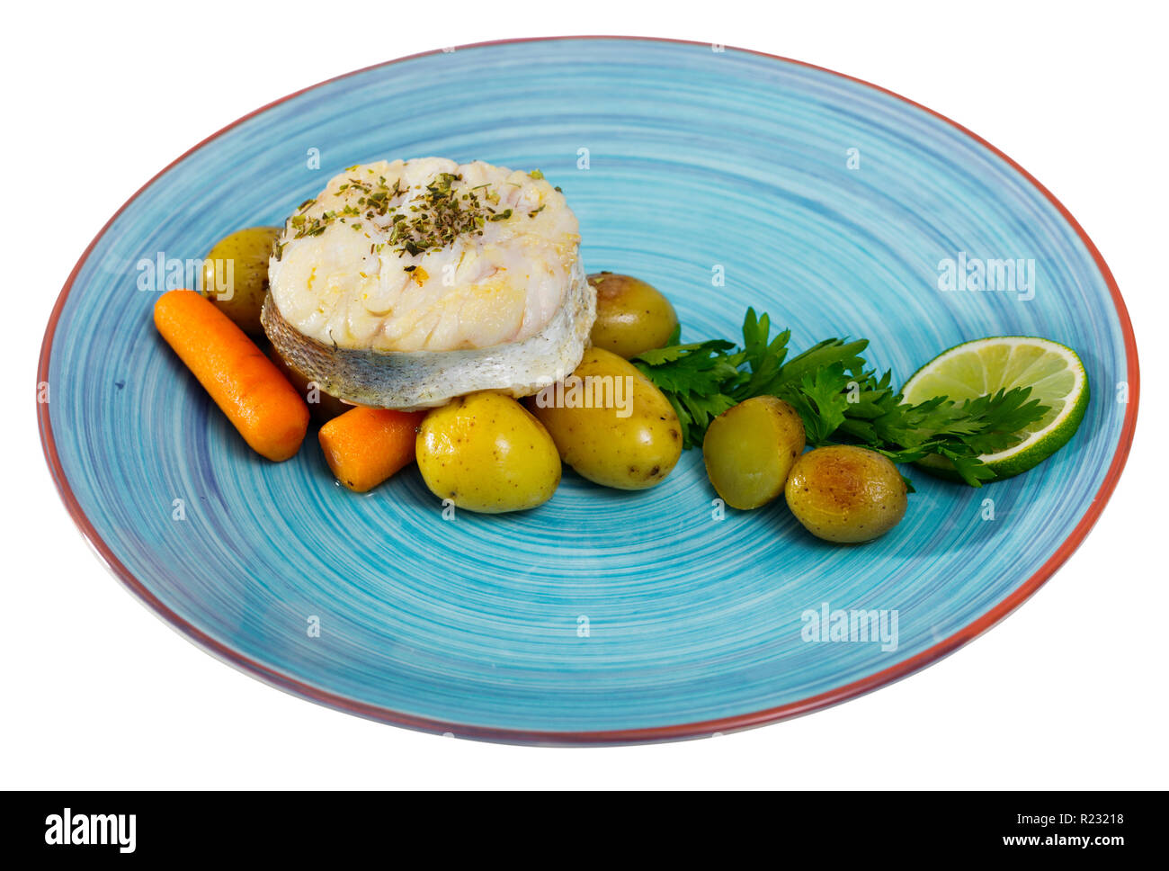 Cod Fish Green Meat Steak of codfish prepared and served with boiled potatoes, carrots and ...