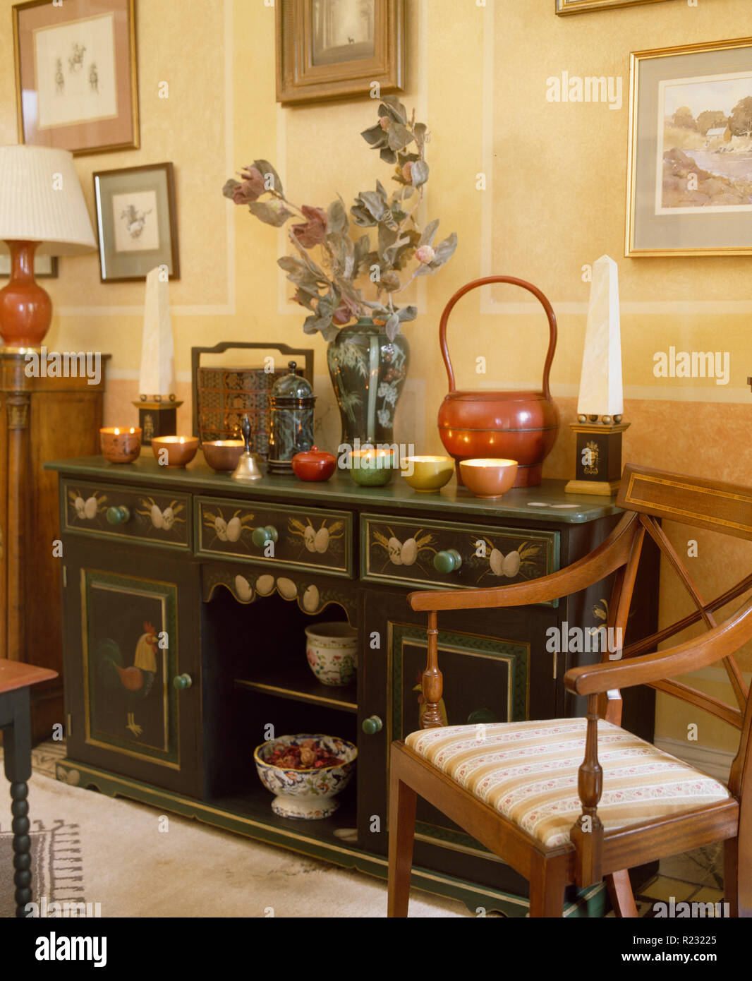 Painted sideboard in old fashioned dining room Stock Photo Alamy