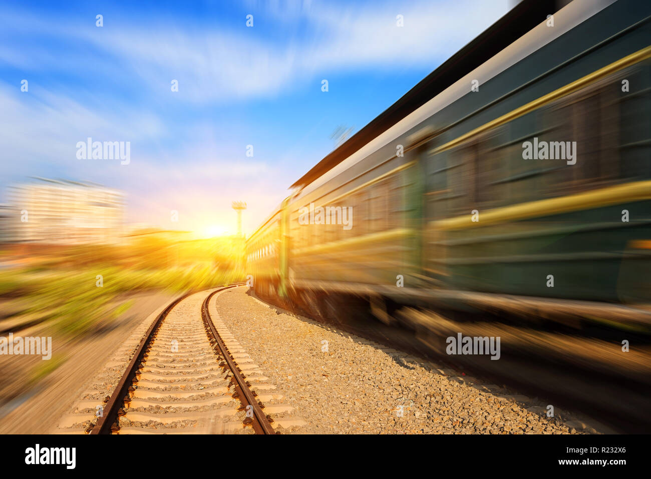 Cargo train platform at sunset with container Stock Photo
