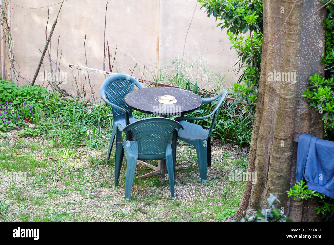 Plastic Chairs And Table High Resolution Stock Photography and Images
