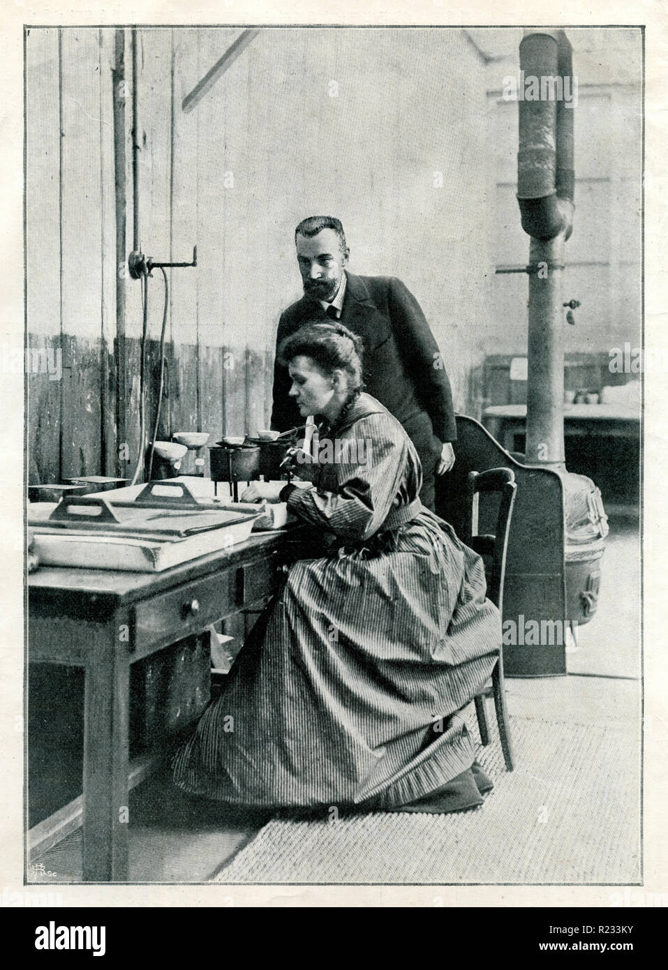 Curie, Marie <1867-1934>, physicist and chemist and Pierre Curie <1859-1906> in their laboratory, Stock Photo