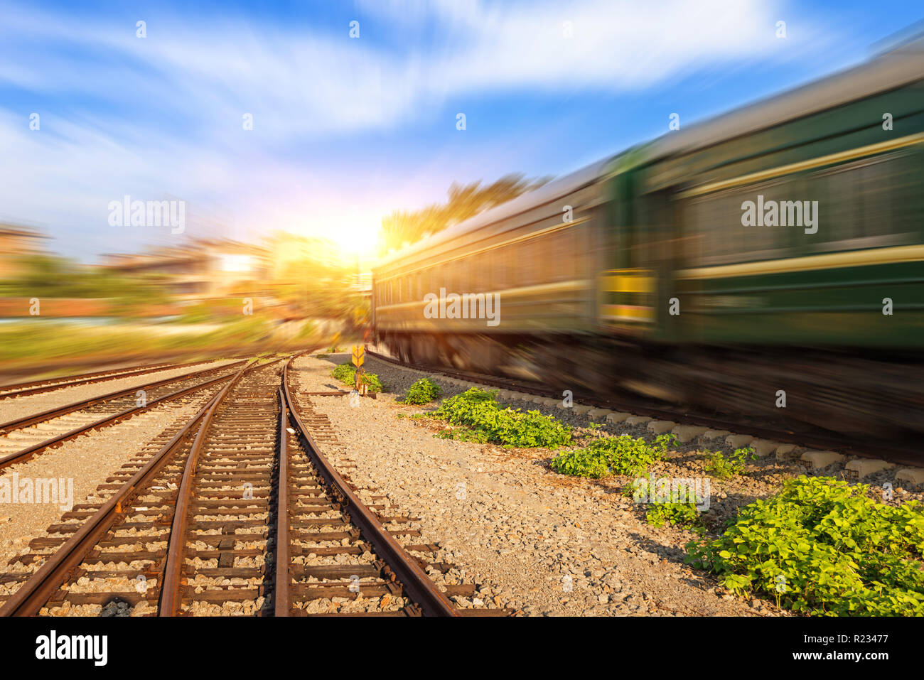 Cargo train platform at sunset with container Stock Photo