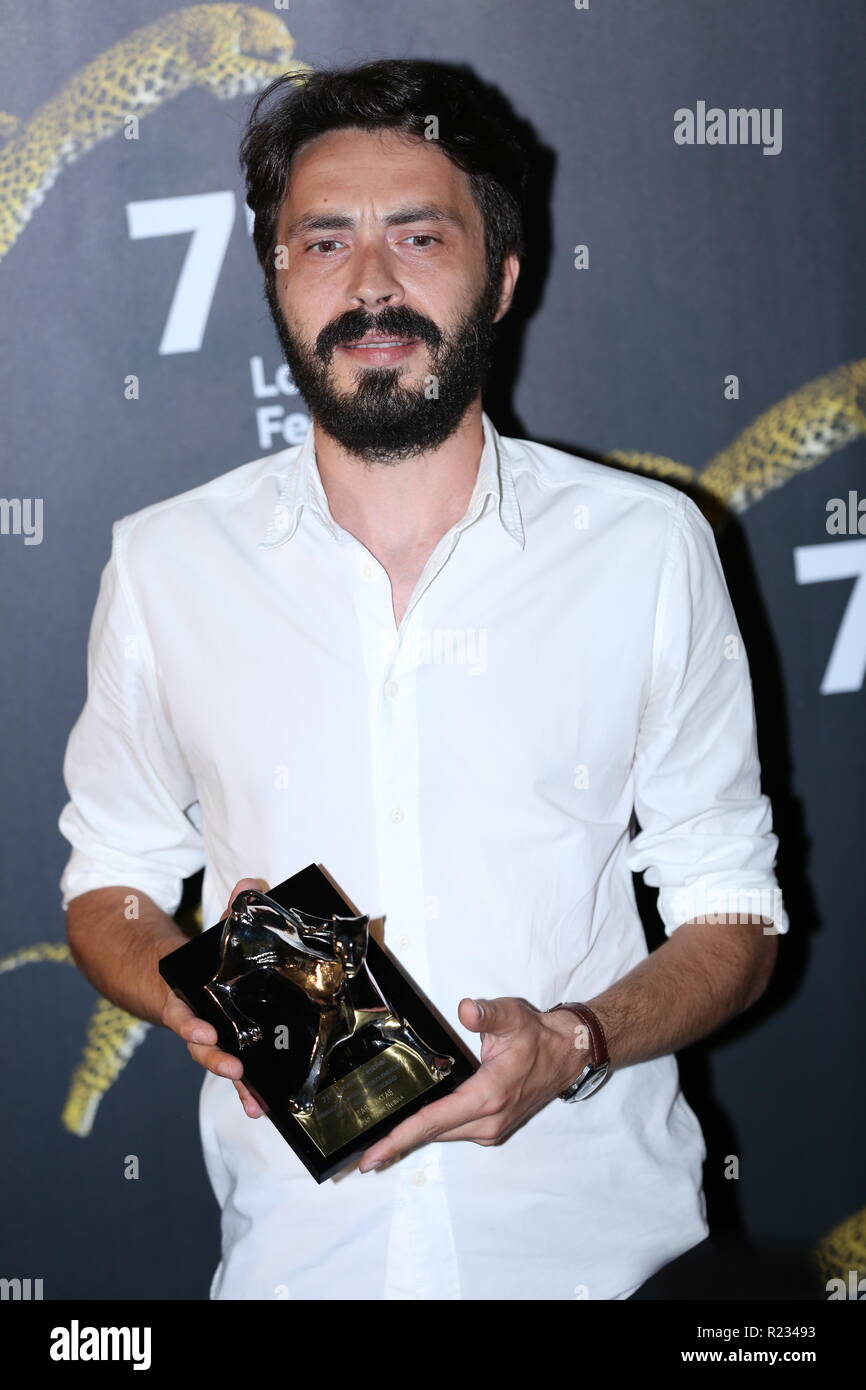 LOCARNO, SWITZERLAND – AUG 11, 2018: Tarık Aktaş receives the Premio per il miglior regista emergente at the 71st Locarno Film Festival (photo: Micka Stock Photo