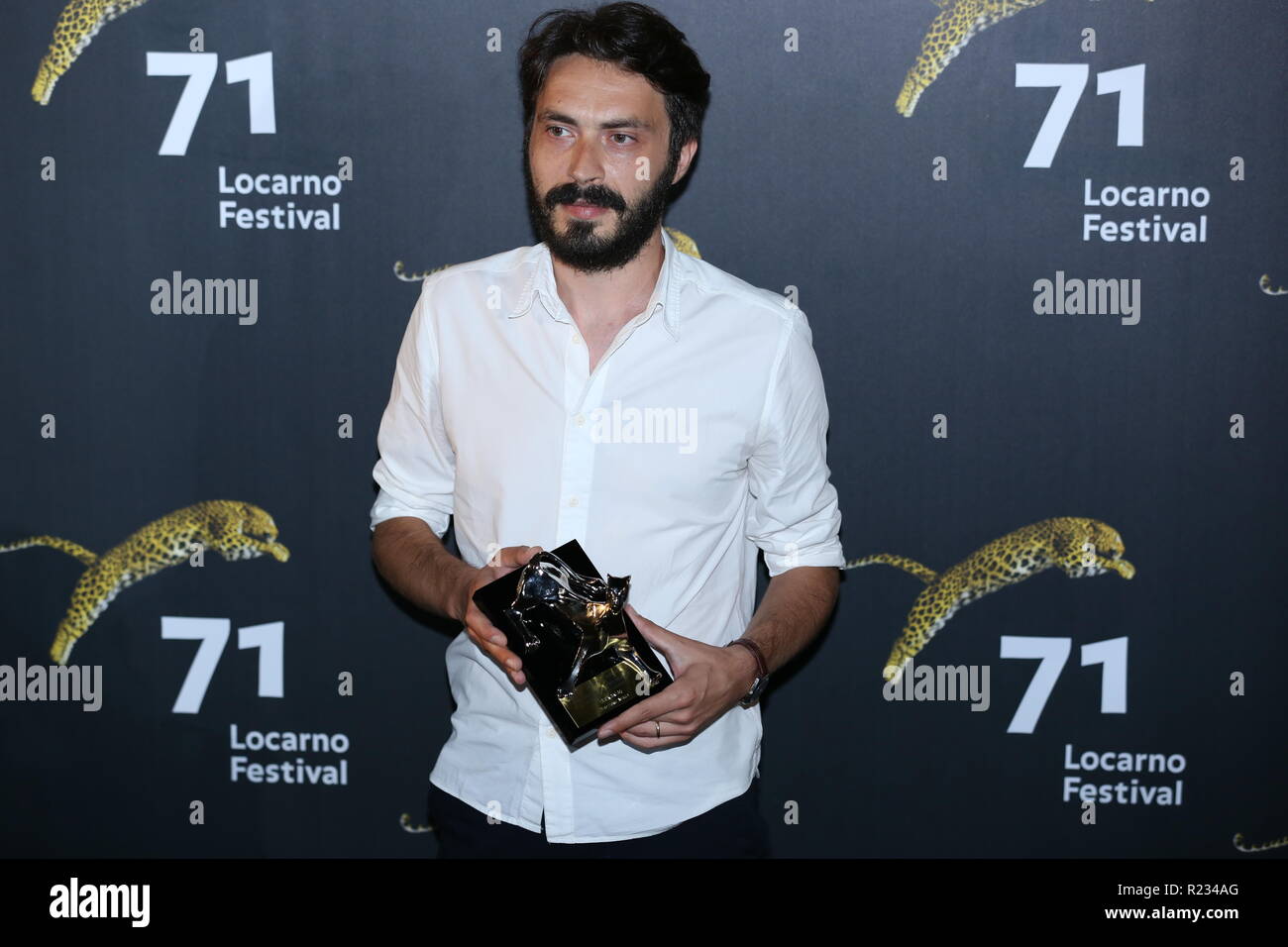 LOCARNO, SWITZERLAND – AUG 11, 2018: Tarık Aktaş receives the Premio per il miglior regista emergente at the 71st Locarno Film Festival (photo: Micka Stock Photo