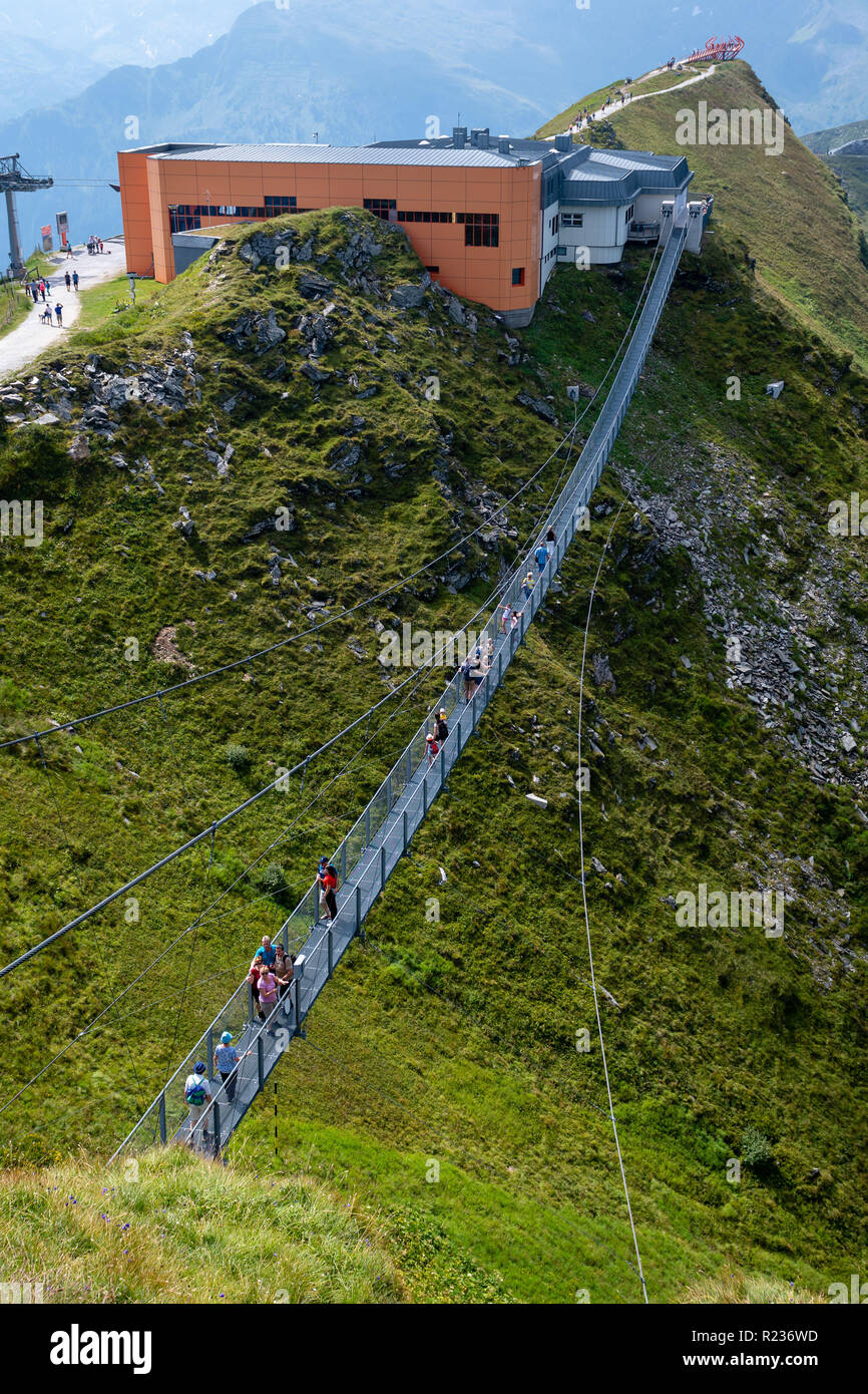 BAD GASTEIN, AUSTRIA AUGUST 06, 2018 People cross a suspension