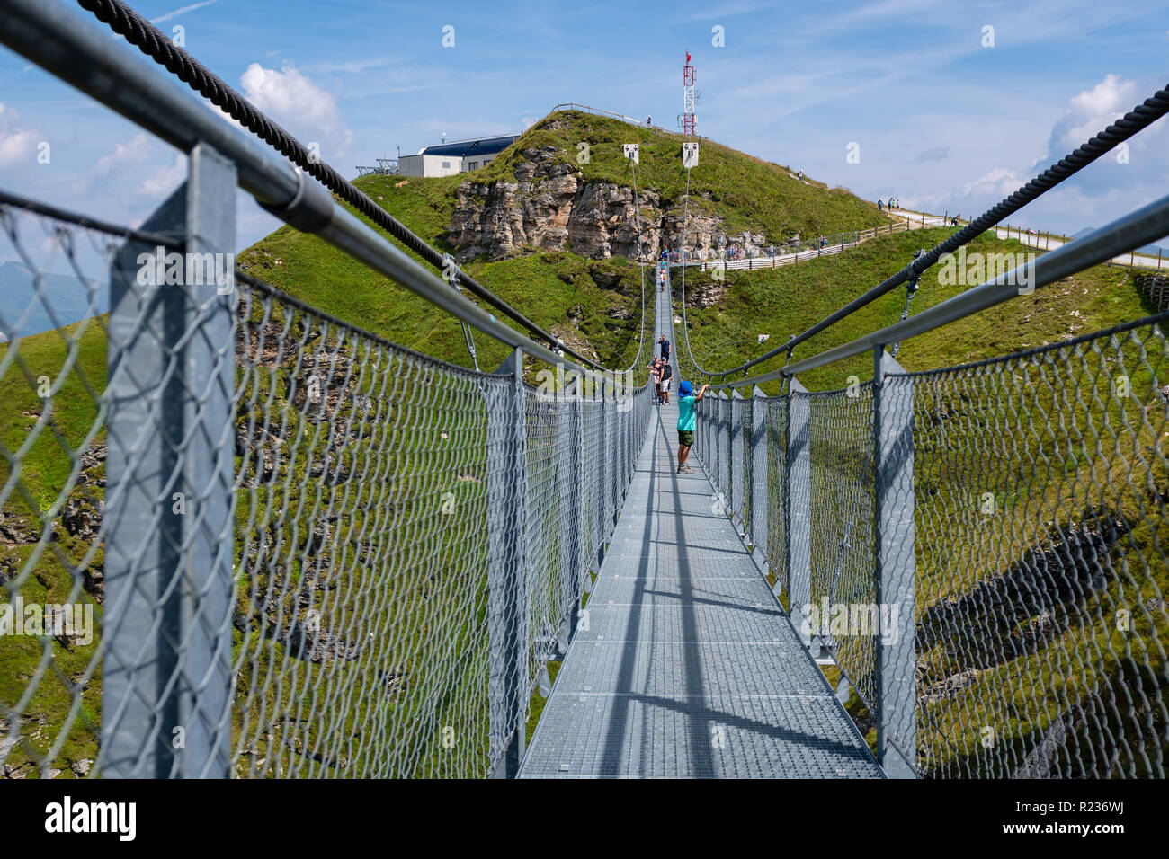 BAD GASTEIN, AUSTRIA AUGUST 06, 2018 People cross a suspension