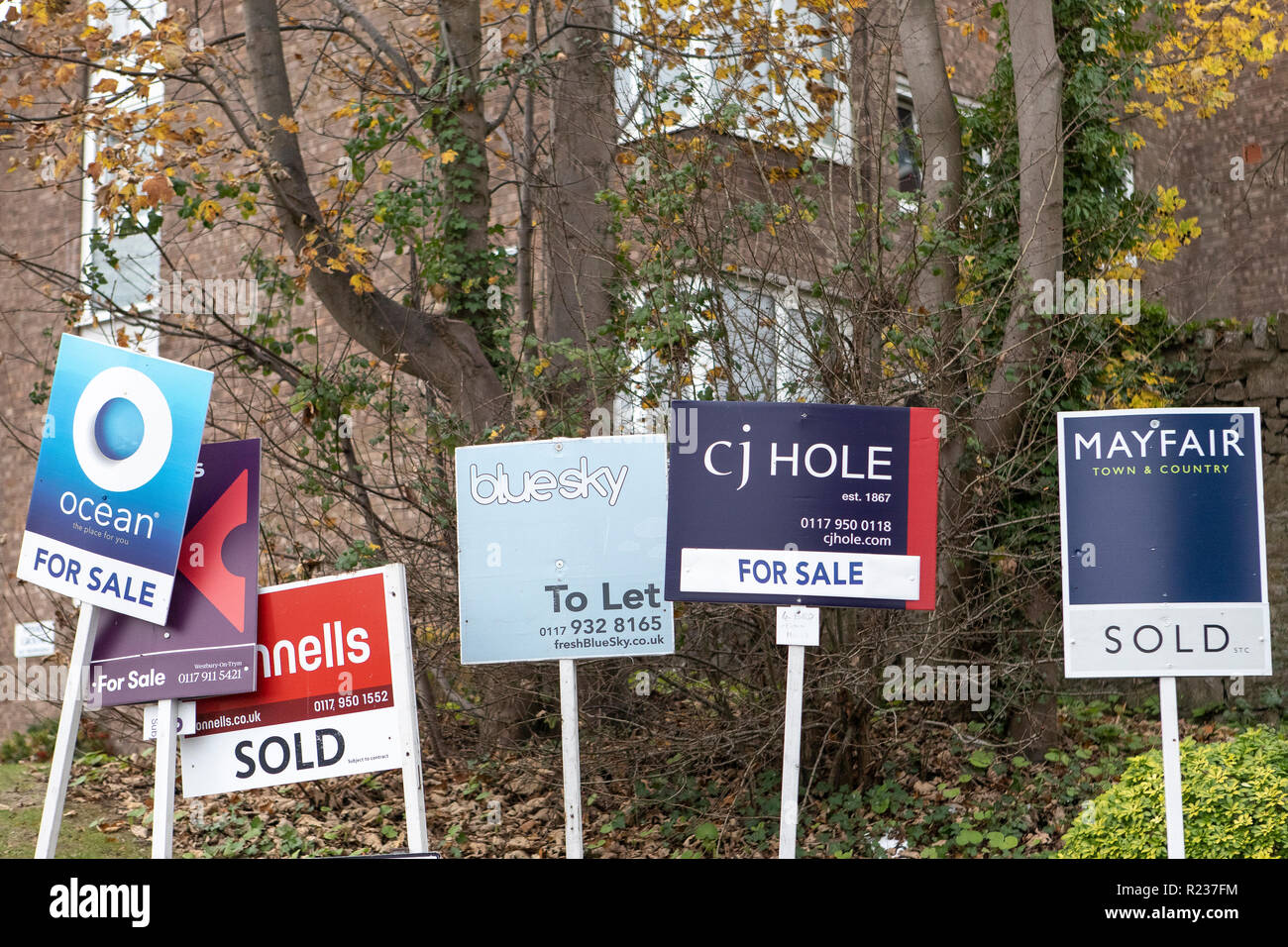 Estate agent For Sale signes outside flats Stock Photo