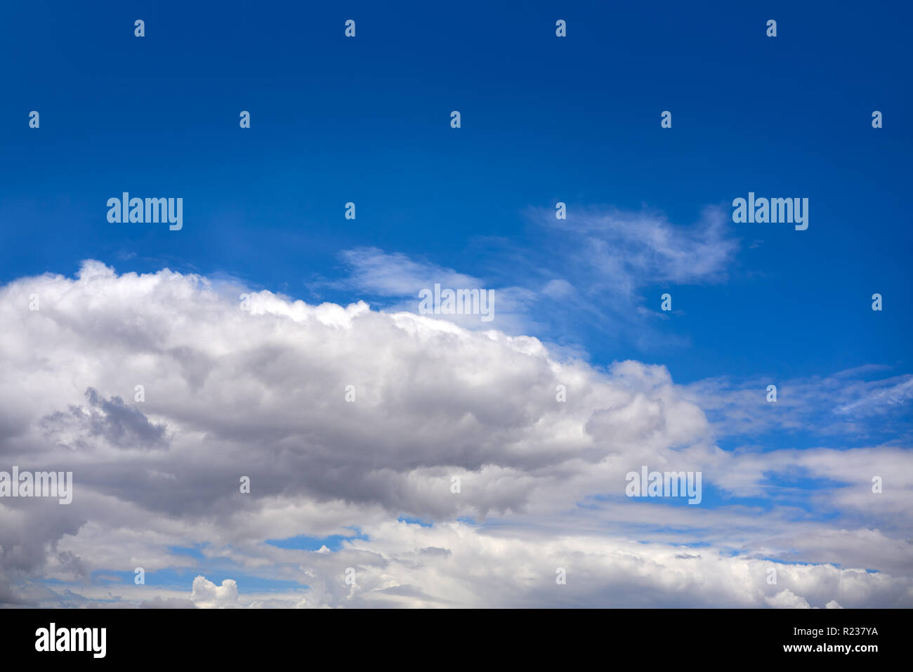 Blue summer sky with cumulus white clouds Stock Photo - Alamy