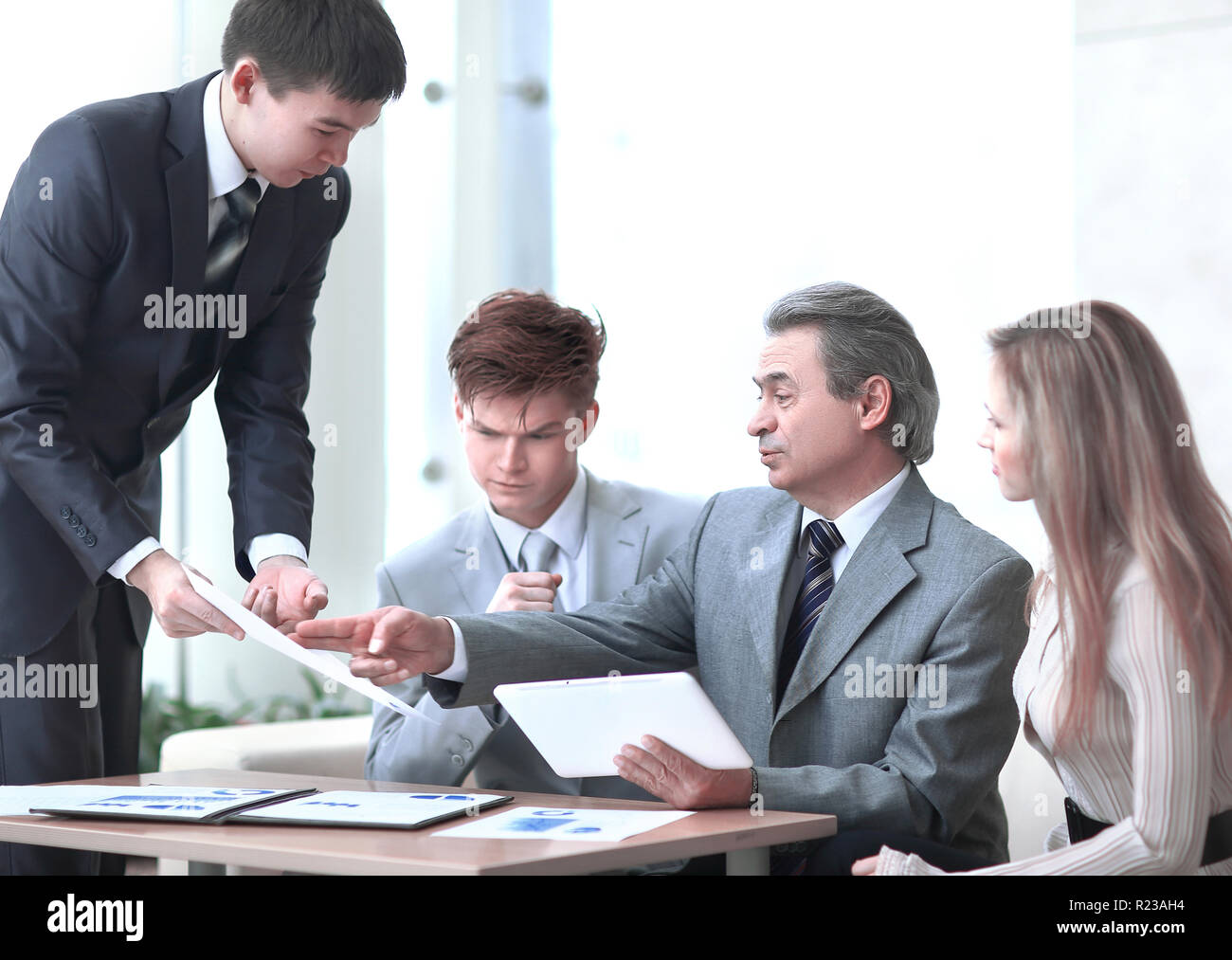 assistant shows the boss the business document.photo with copy space Stock Photo
