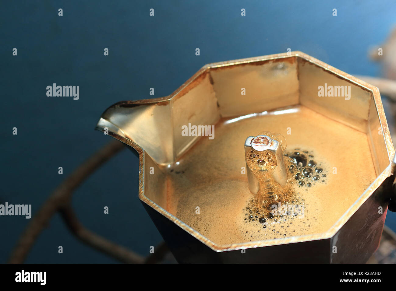 The coffee is boiling. Have crema flowing up on the moka pot Stock Photo -  Alamy