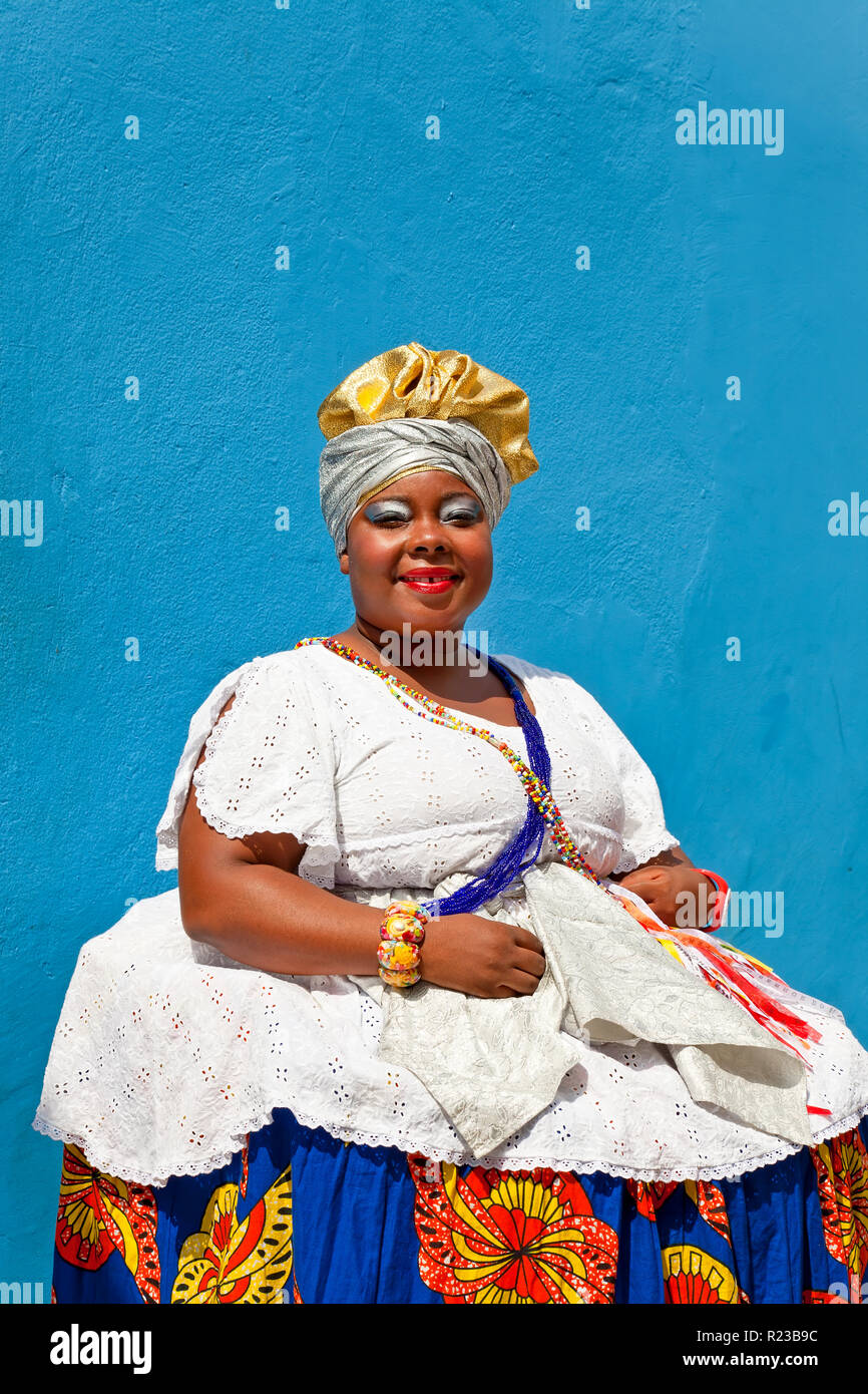 Bahia, Brazil - December 2011: Woman in traditional Bahian dress, Salvador de Bahia, Pelourinho historic district, Stock Photo