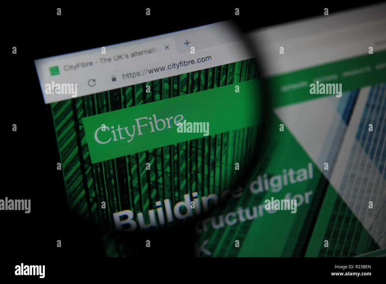 CItyFibre website seen through a magnifying glass Stock Photo