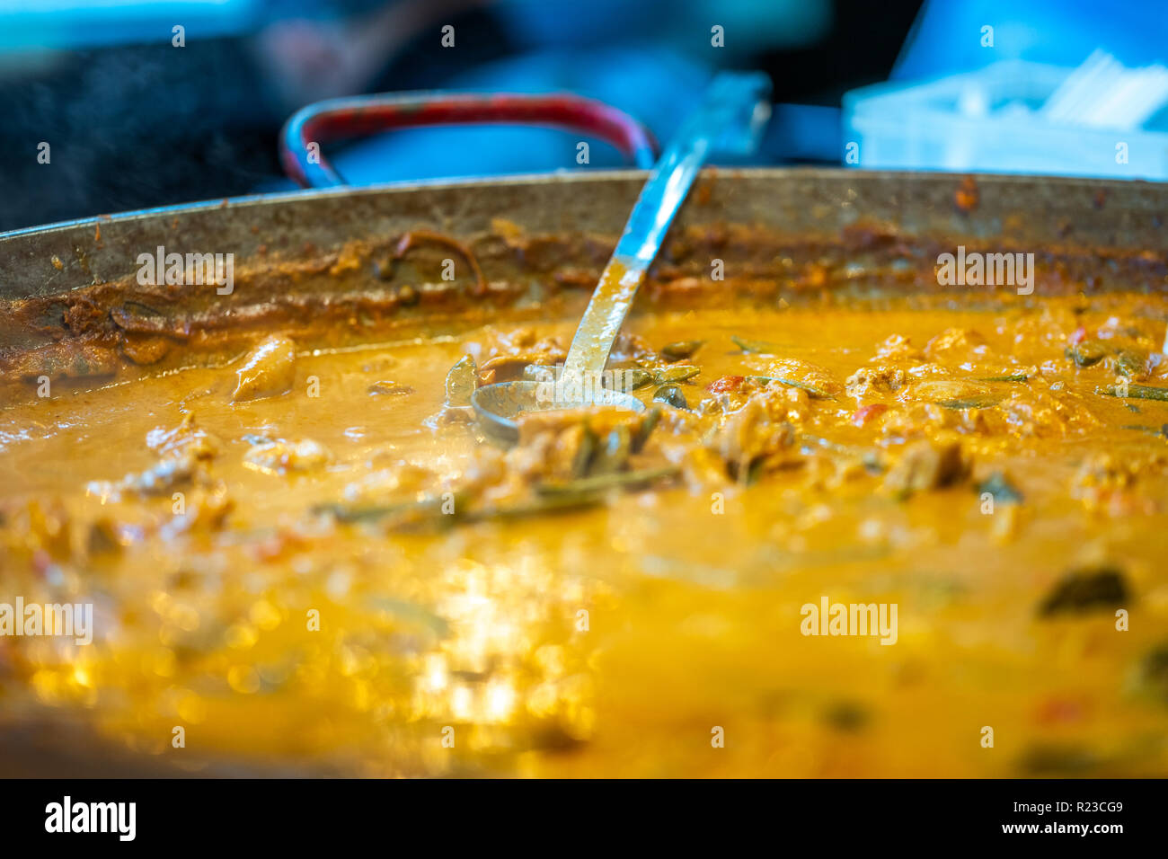 Traditional chu chi chicken curry, thai cuisine close up in a food market Stock Photo