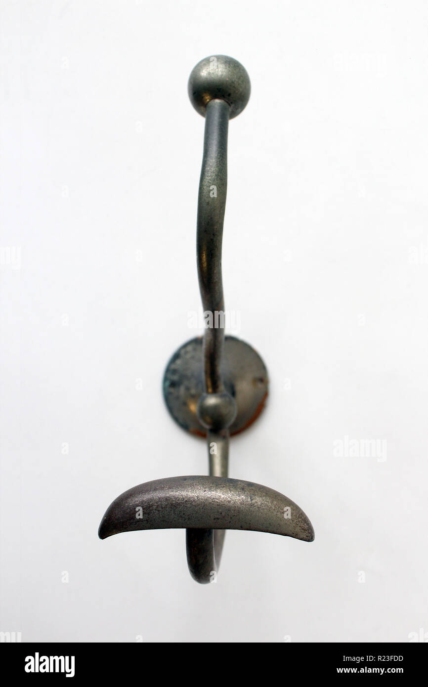 Metal wall hanger isolated on a white background, closeup Stock Photo Alamy