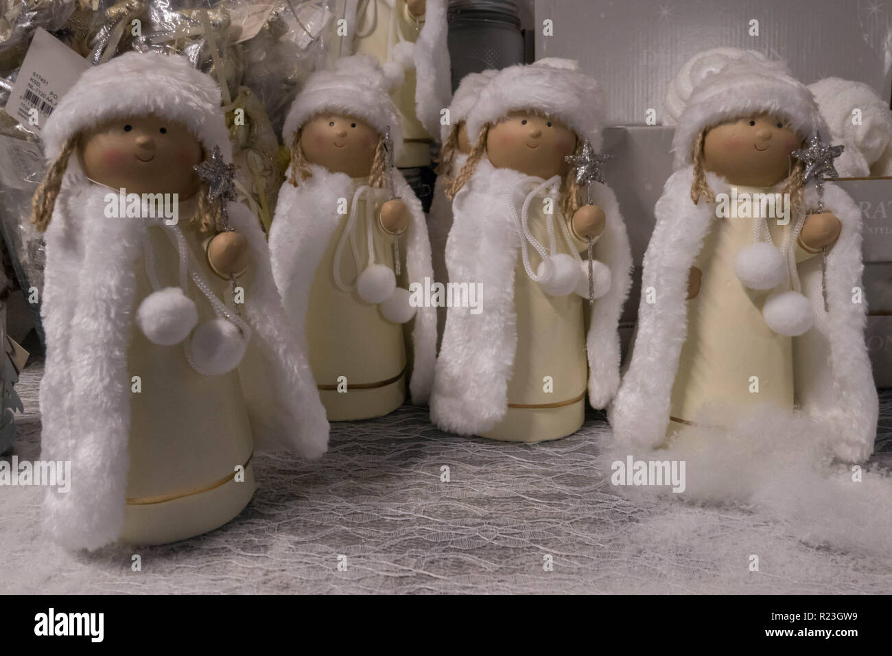 Figurines of angels in the snow Stock Photo Alamy