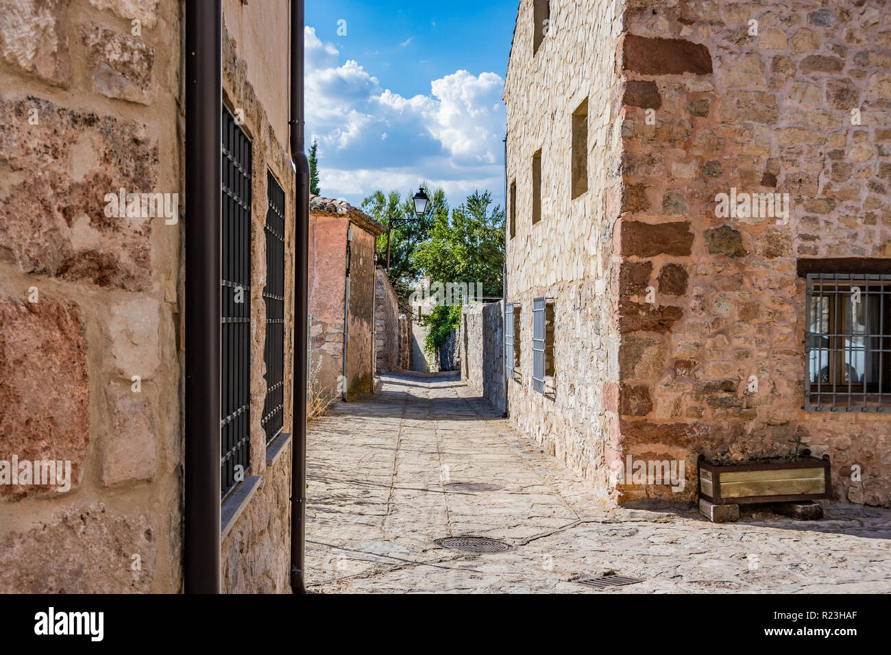 Typical street where the stone predominates the old and medieval city of Medinaceli. Soria Spain Stock Photo