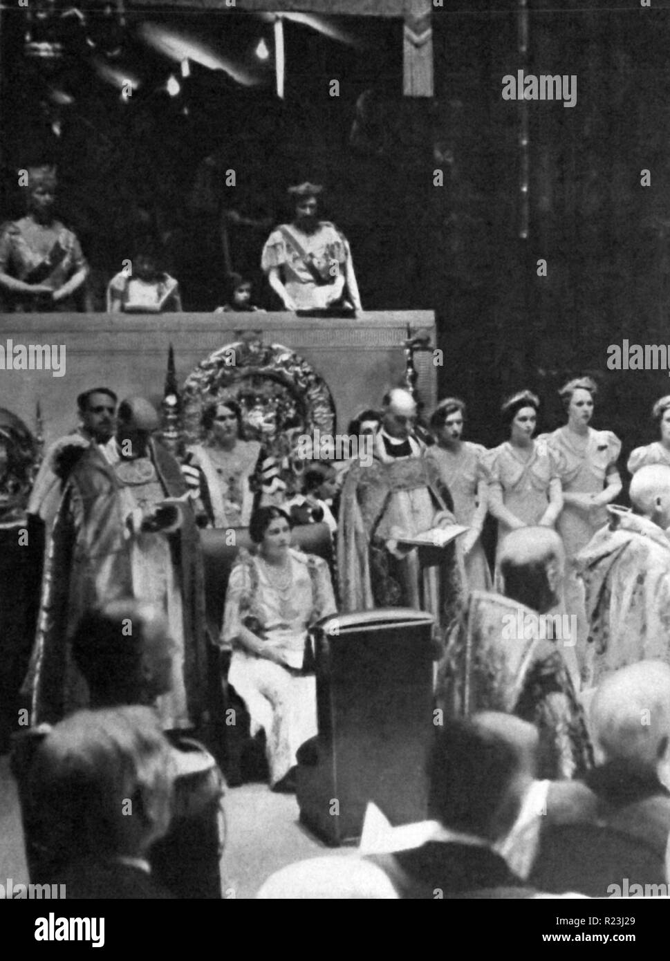 Queen Elizabeth (the Queen Mother) wife of King George VI with her two daughters Princess (later Queen) Elizabeth and princess Margaret at the coronation of King George 1937 Stock Photo
