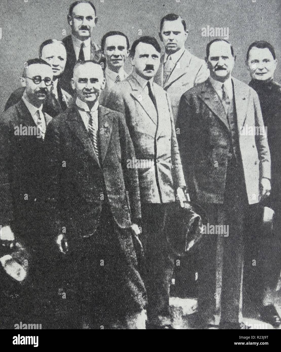 Photograph of the Nazi leaders before they came into power. First row left to right: Himmler, Chief of the Gestapo; Frick, Minister of the Interior; Fuehrer Adolf Hitler; General Von Epp, President of Colonial League; and Field-Marshal Goering. Back row left to right: Mutschmann Governor of Saxony; Josef Goebbels, Minister of Propaganda; Heydebreck. In the rear is Bernhard Rust, Minister of Education. Dated 1932 Stock Photo