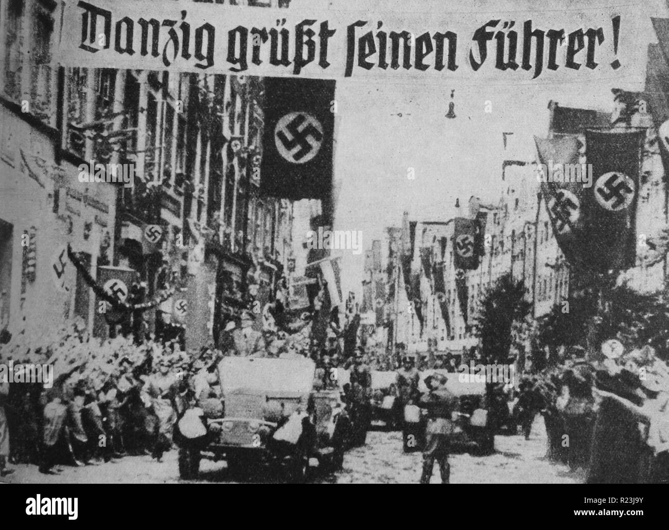 Photograph of a parade in Danzig greeting Hitler and Nazi soldiers. Dated 1939 Stock Photo