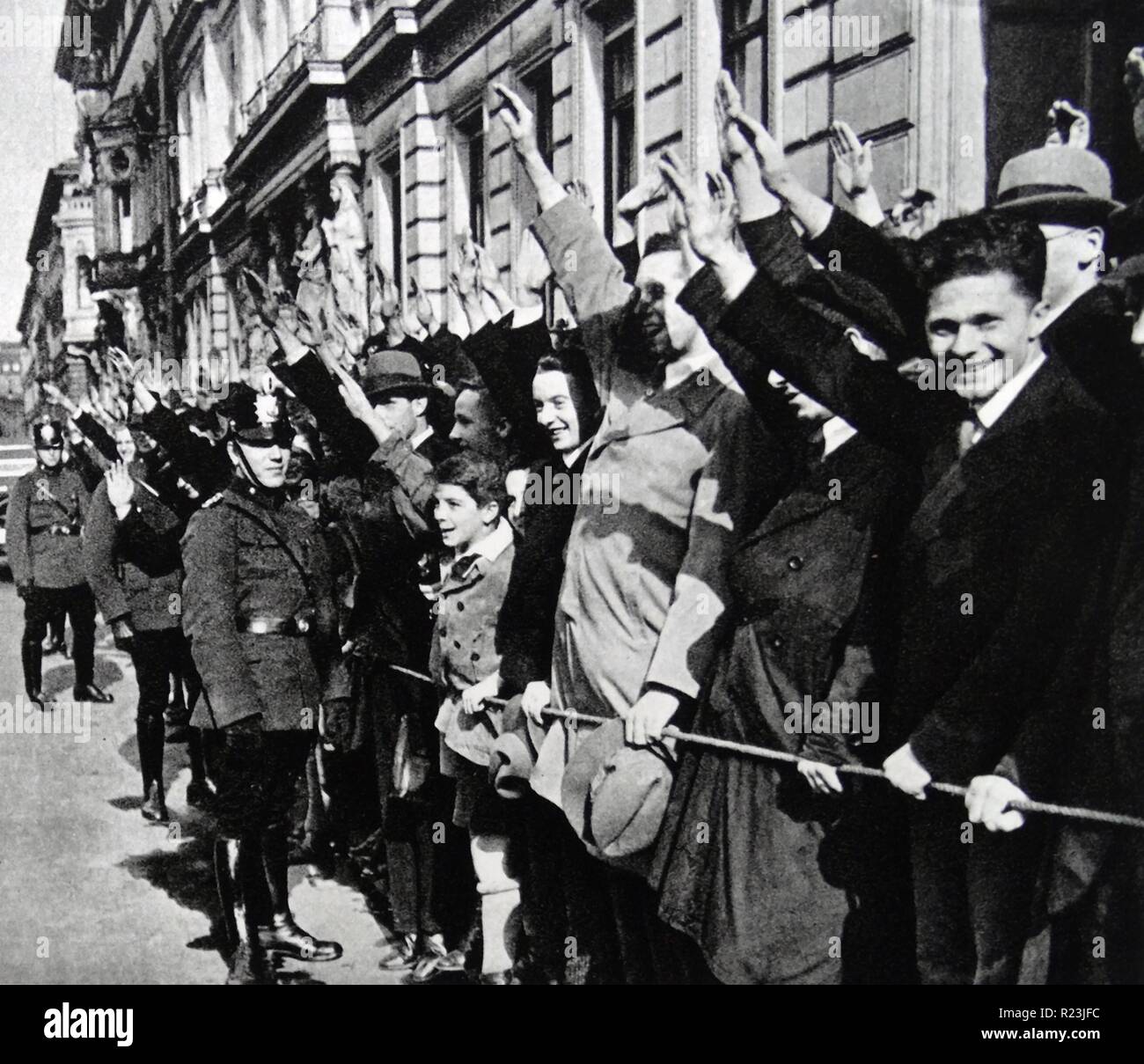 Photograph of German youths saluting in support of Adolf Hitler. Dated 1940 Stock Photo