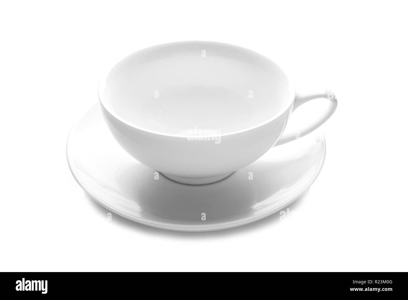 Clear cup on white Black and White Stock Photos & Images - Alamy