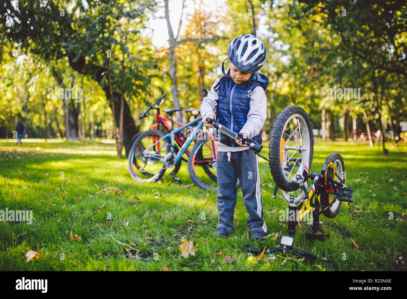 Subject child and profession. A little blond Caucasian boy uses a