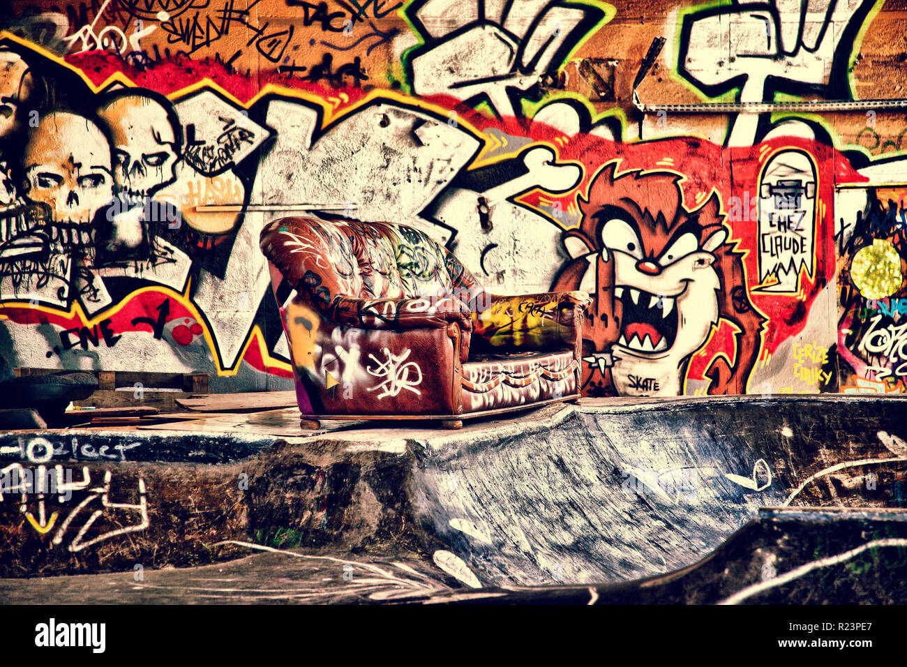 Sofa in a disused warehouse Stock Photo