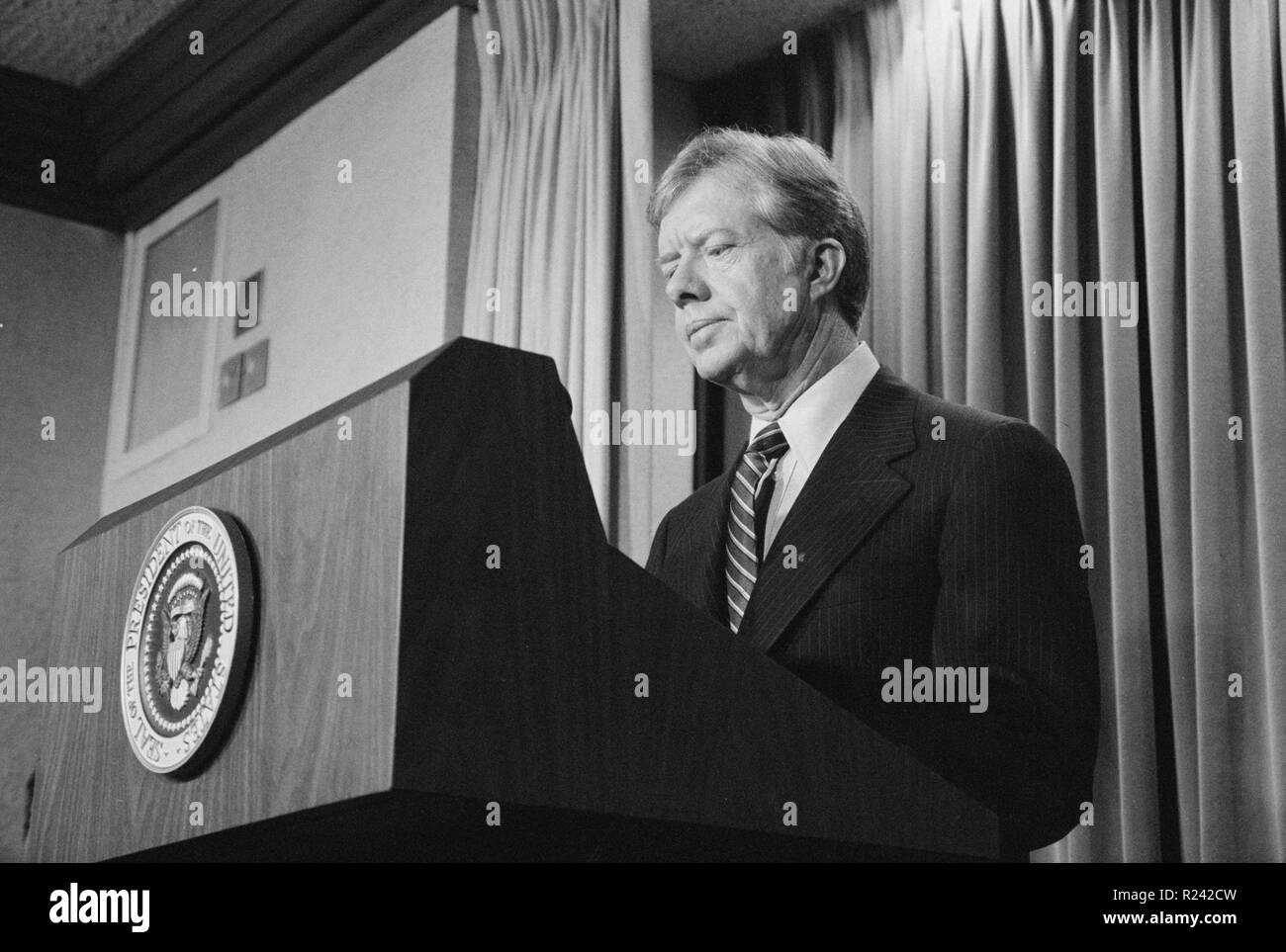 Photograph of President Jimmy Carter announcing new sanctions against Iran following the taking American hostages. Photographed by Marion S. Trikosko. Dated 1980 Stock Photo