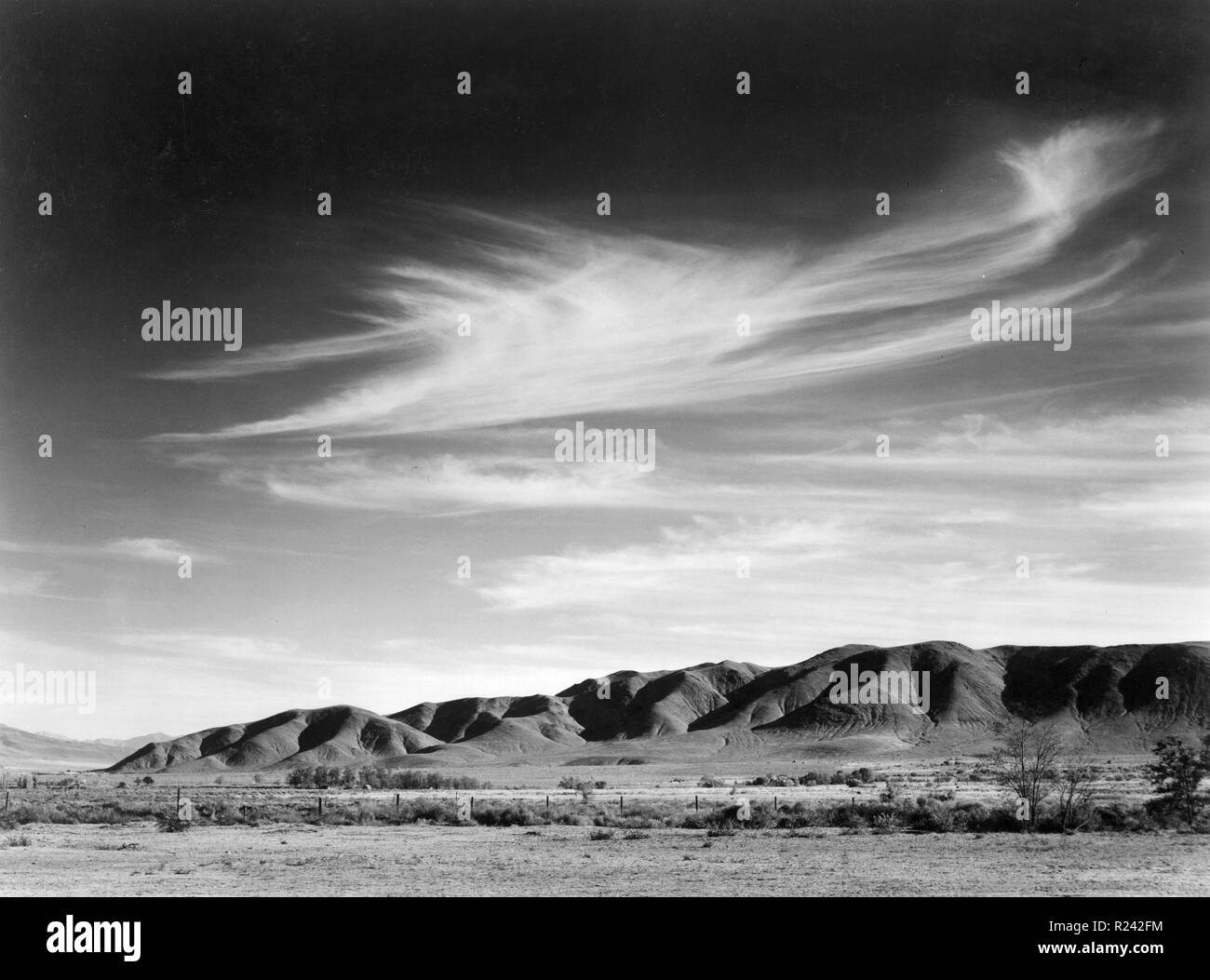 Photograph of a view from Manzanar to the Alabama Hills. Photographed by Ansel Adams (1902-1984) photographer. Dated 1943 Stock Photo