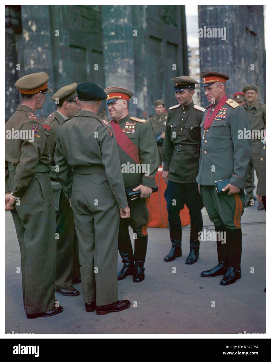 Russian army Marshal Georgy Zhukov, Marshal Konstantin Rokossovsky, and Soviet officers greet British Field Marshall Bernard Montgomery, Berlin 1945 Stock Photo
