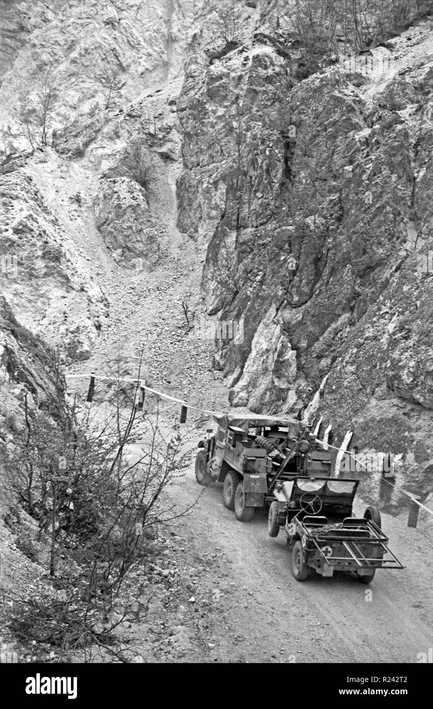 US Army truck towing a jeep in the Monte Cassino area, Italy, World War Two 1944 Stock Photo